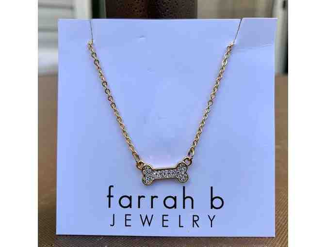 Farrah B Jewelry Necklace! Gold tone with CZ stones of a dog bone!