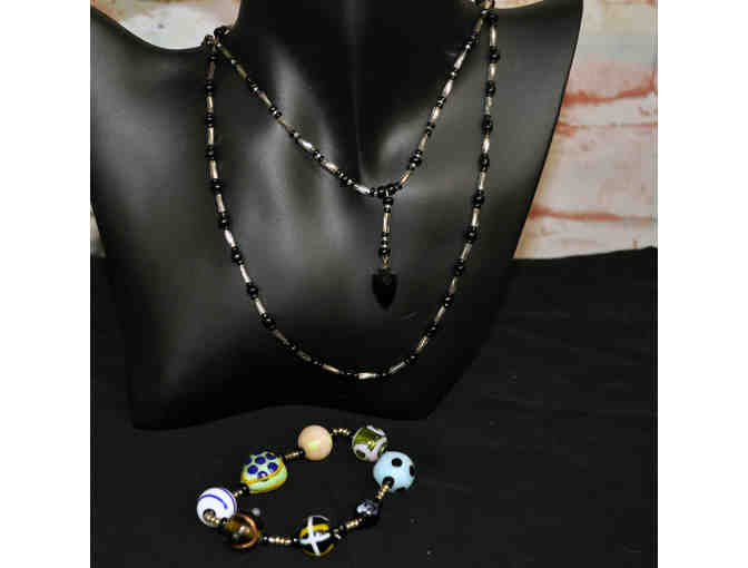 Two Black and Clear Beaded Necklaces and Multi-Colored Glass Bead Stretch Bracelet