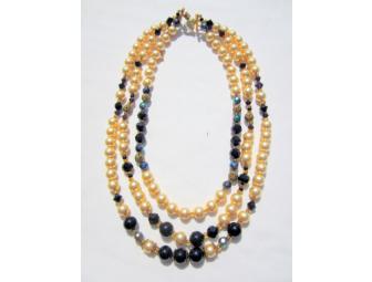 TRIPLE STRAND ONE OF A KIND PEARL/ONYX NECKLACE