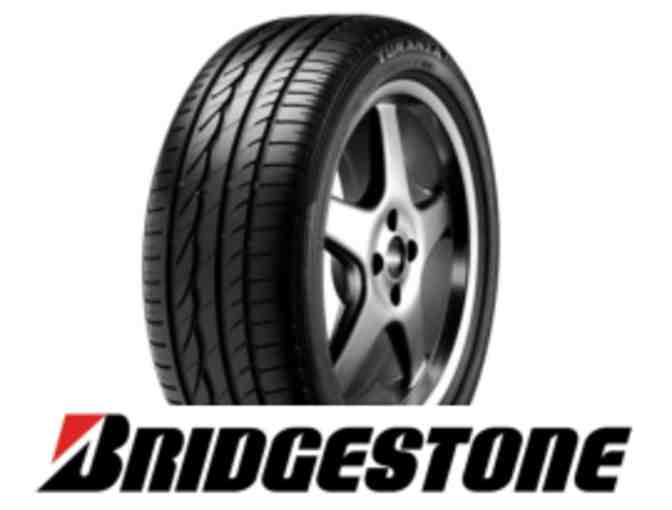 Bridgestone set of 4 tires and 3 oil changes