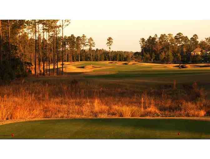 One foursome with carts at St. Johns Golf and Country Club in St. Augustine, FL.