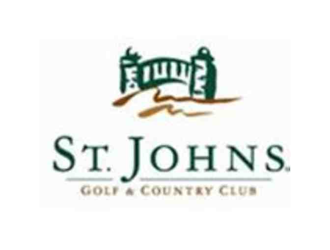 One foursome with carts at St. Johns Golf and Country Club in St. Augustine, FL.