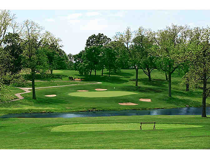 St. Joseph Country Club - a foursome with carts and range balls