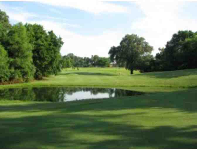 Covington Country Club - One foursome with cart and range balls