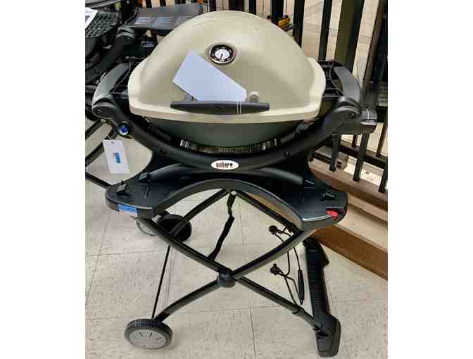 Weber Grill and Cooler filled with Accessories