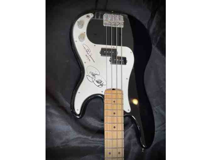 A Signed Fender Precision Bass Guitar (AC/DC and Sytx)