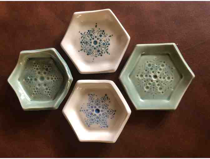 Four Sea Urchin Pottery Plates