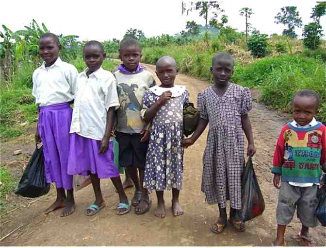 Fund a need: Purchase a school kit for a Ugandan orphan! - Photo 2