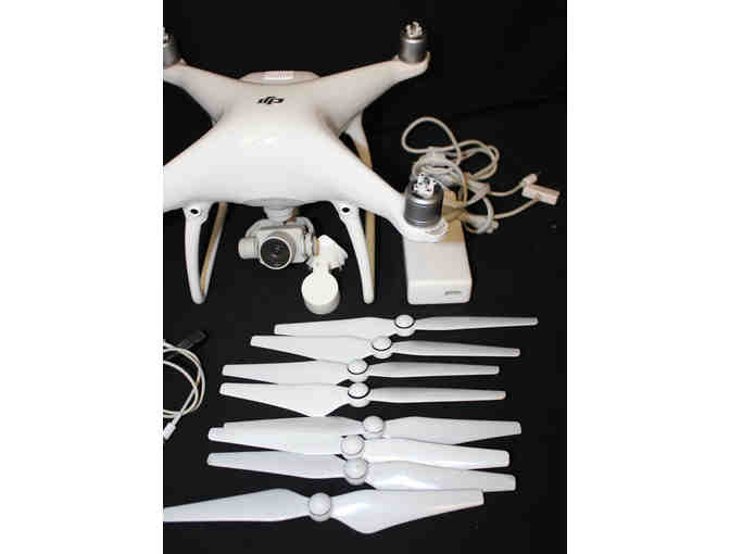 DJI Phantom 4 Quadcopter + Accessories - POWERS ON, NO FURTHER TESTING