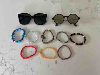 2 pairs of sunglasses and 7 bracelets from Fourth Dimension Clothing Boutique