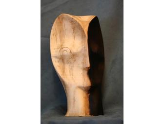 Two Faced Wooden Sculpture