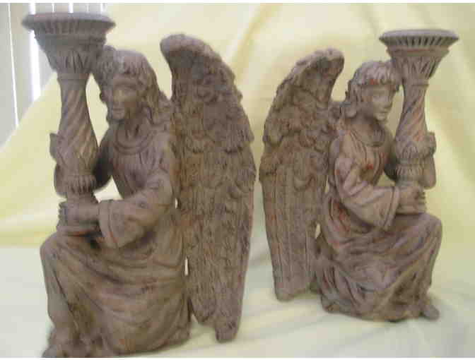 A Set of Bronze Angel Candle Holders
