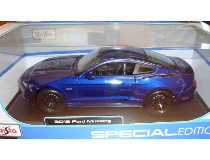Mustang backpack, Mustang cufflinks, and 2015 Mustang 1:18 scale model 2