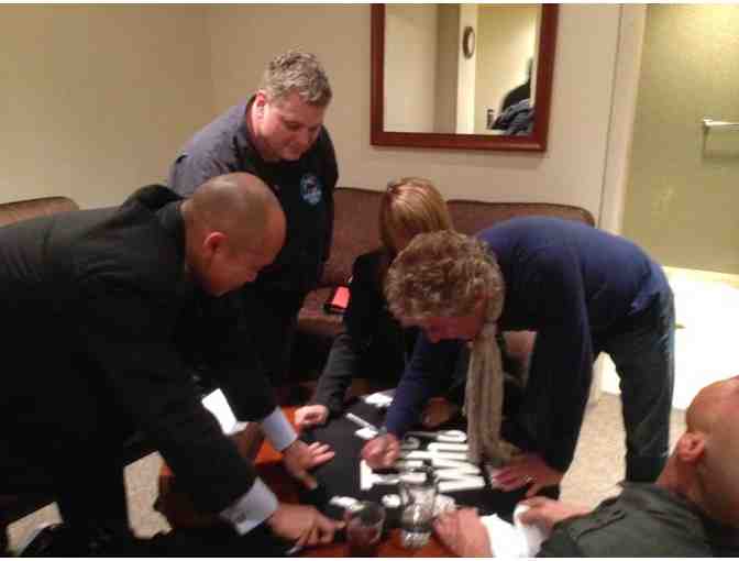 The Who Quadrophenia Tour t-shirt signed by Roger Daltrey with backstage pass sticker