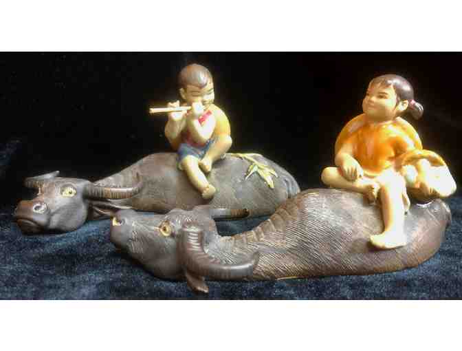 Ceramic Girl and Boy on Water Buffalos