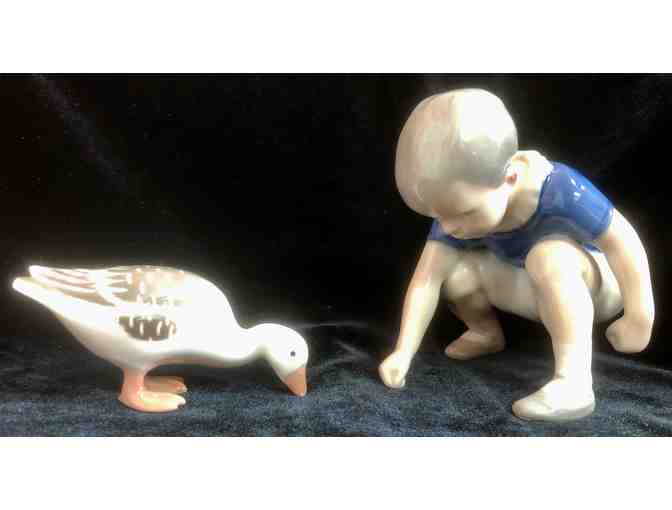 Porcelain Boy Feeding Goose