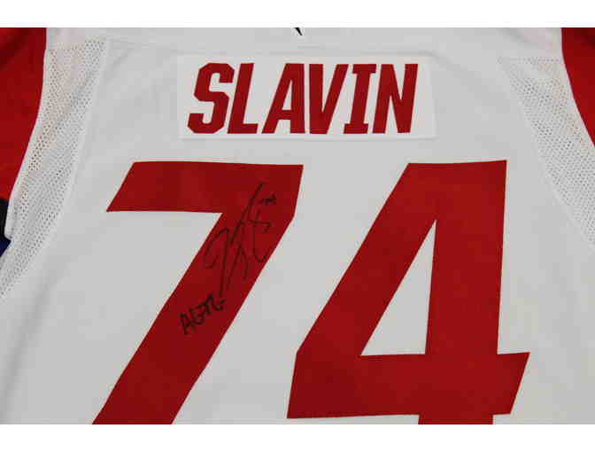 Jaccob Slavin Autographed Jersey and Game Used Stick