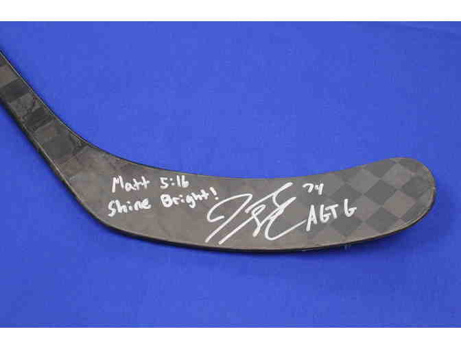 Jaccob Slavin Autographed Jersey and Game Used Stick