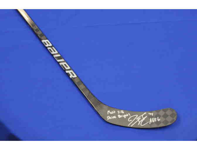Jaccob Slavin Autographed Jersey and Game Used Stick