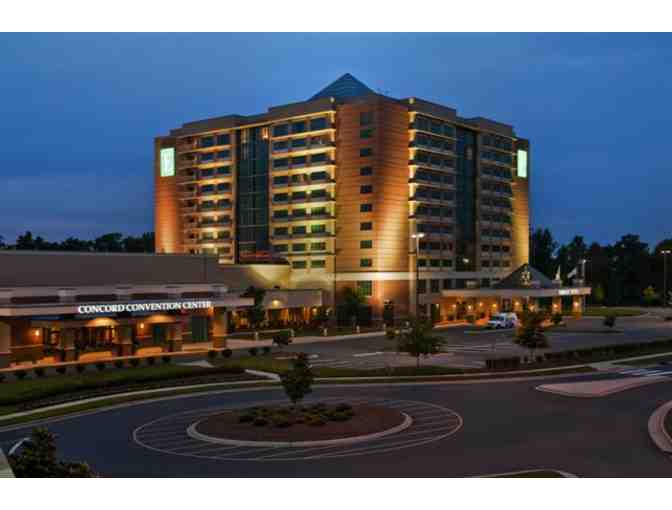 Stay at Embassy Suites by Hilton Charlotte - Concord Golf Resort & Spa and spa gift card