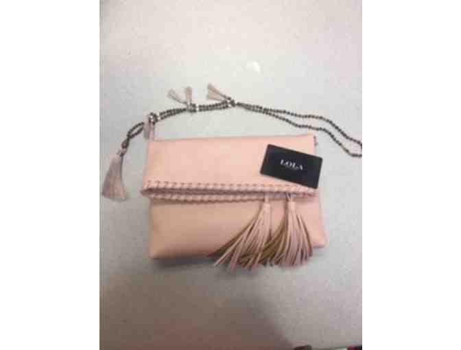 A leather clutch, tassel necklace, and $50 gift certificate from Lola, NY in White Plains