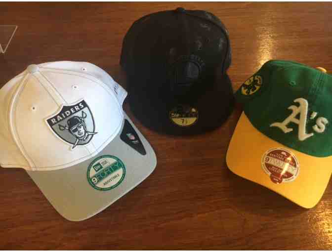 Baseball caps for an Oakland fan (Warriors, A's and Raiders)