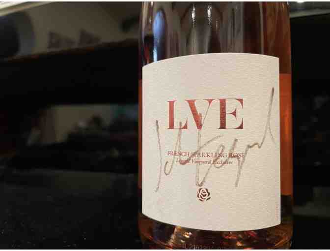 Bottle of LVE French Sparkling Rose signed by John Legend
