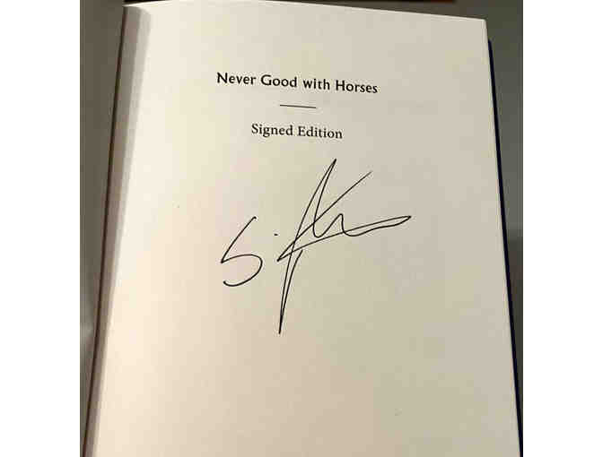 Book of Poetry Never Good with Horses signed by the author