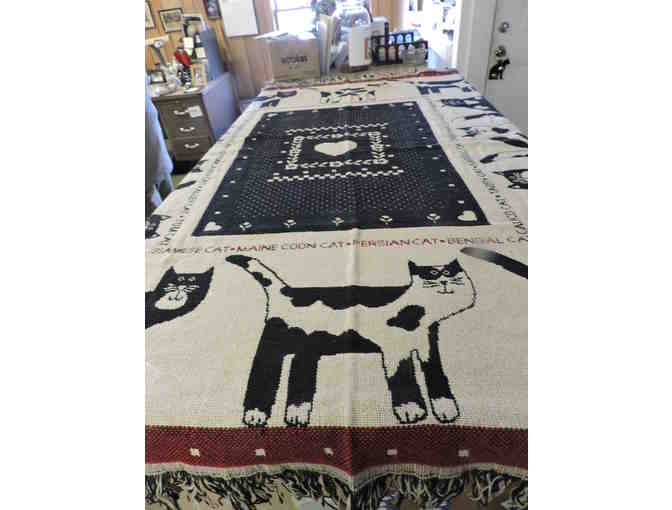 Woven fringed throw with cats