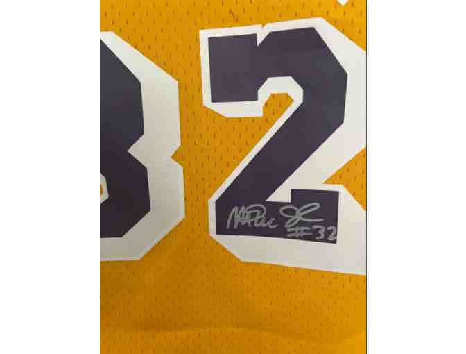 Autographed Basketball Jersey by Magic Johnson