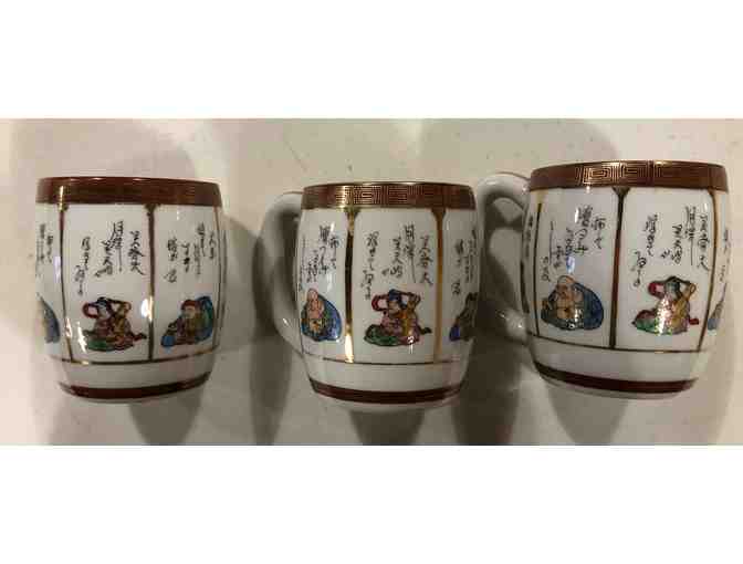 Lot of 3 Asian decorated mugs with gold trim