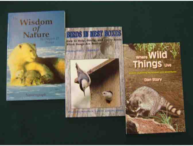 Three books: 'Where the Wild Things Live, 'Birds in Next Boxes' and 'The Wisdom of Nature'