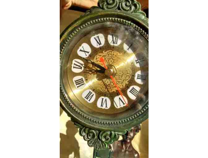 Charming working statuary clock