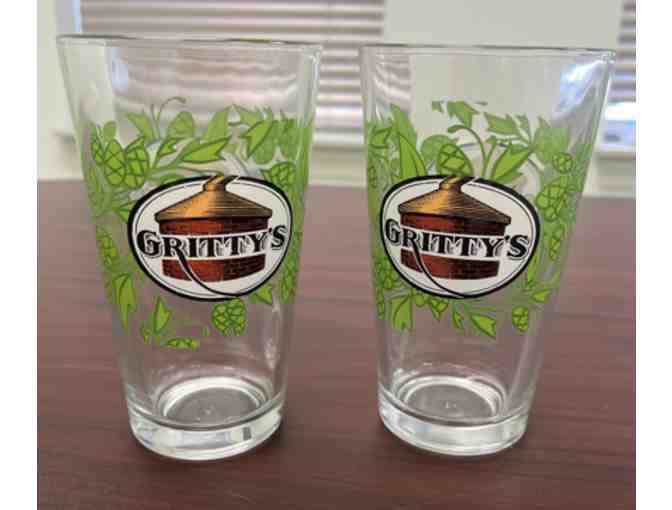 Two $25 gift cards to Gritty McDuff's, two pint glasses, and a Gritty's t-shirt