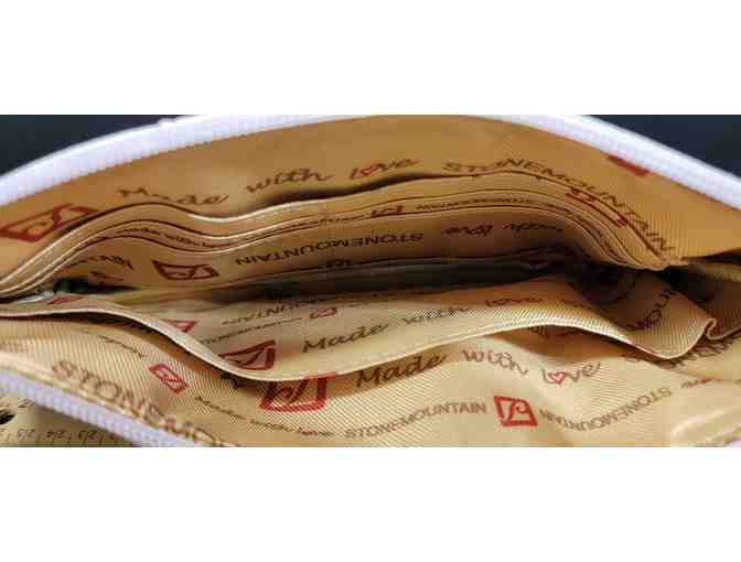 Stone Mountain Rose colored wristlet