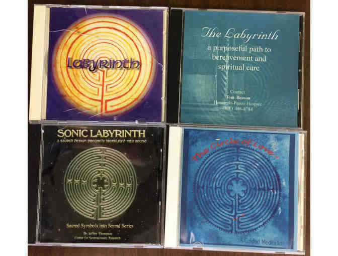 Twelve labyrinth CDs