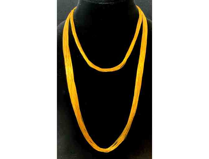 Set of two golden fine multi-strand necklaces