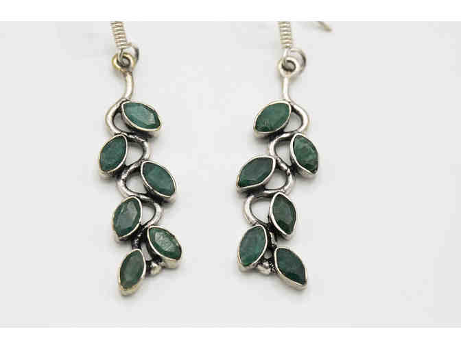 Leaf-shaped emerald earrings set in sterling silver