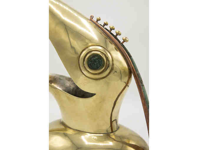 Mexican copper pitcher in the shape of a toucan